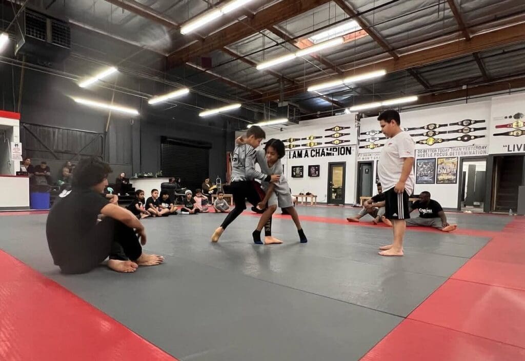 Children practicing MMA in Gardena, developing lifelong discipline, focus, and self-respect.