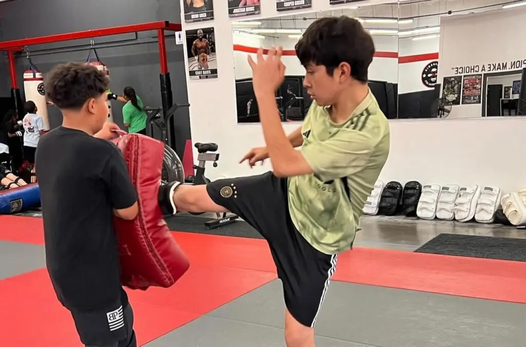 Children practicing Muay Thai in Gardena, developing lifelong discipline, focus, and self-respect.