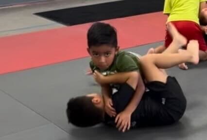 Happy kids in Gardena learning Brazilian Jiu-jitsu, improving balance, coordination, and having fun while building life skills.